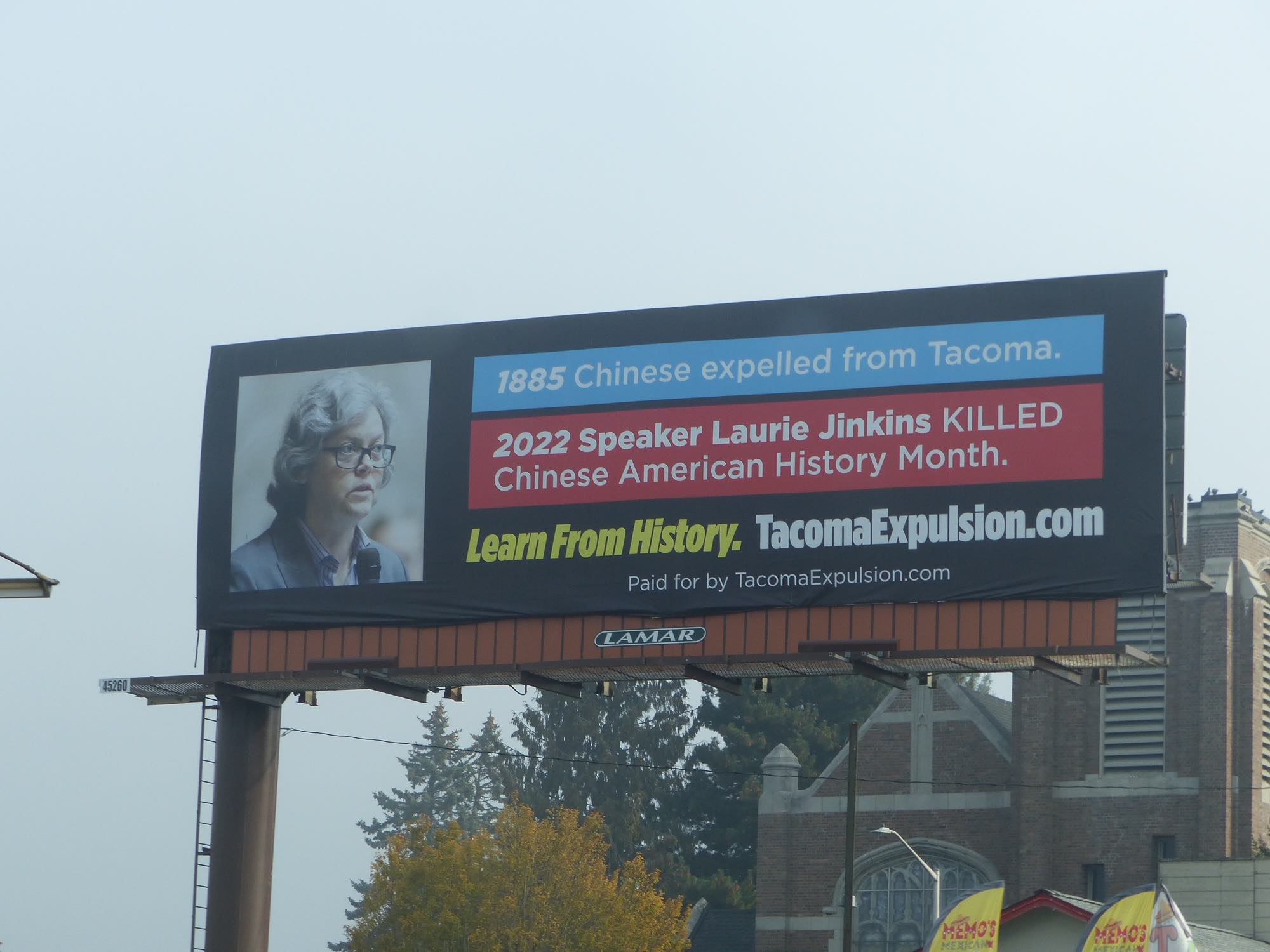 A third billboard is up in Tacoma across from a middle school. The message on the board says "Learn From History"